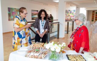 Visitors browsing refreshments and jewellery during the gallery’s artist showcase