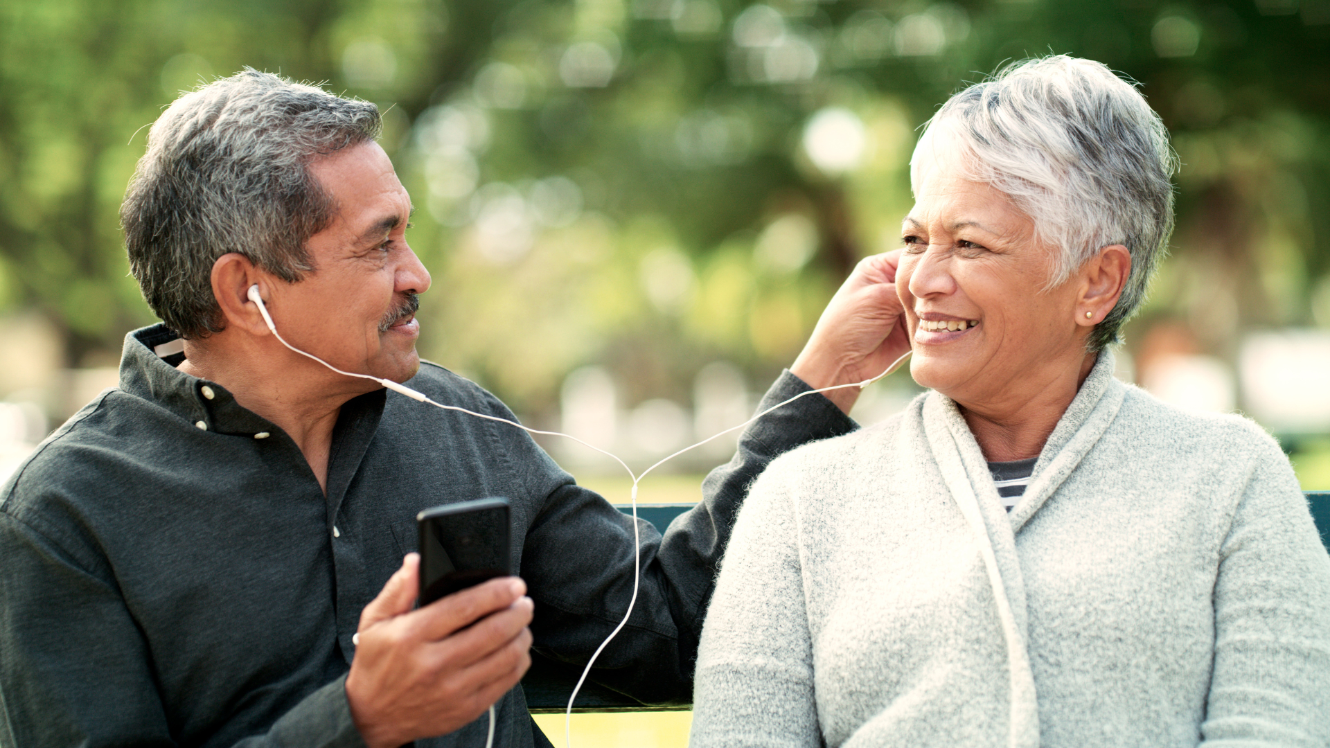 Man and Women listening to music